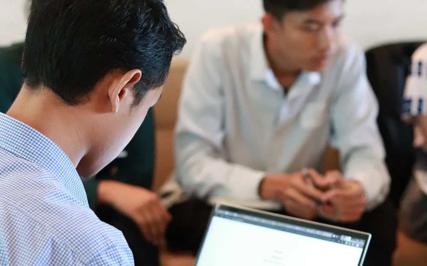 Business team using laptops during a meeting