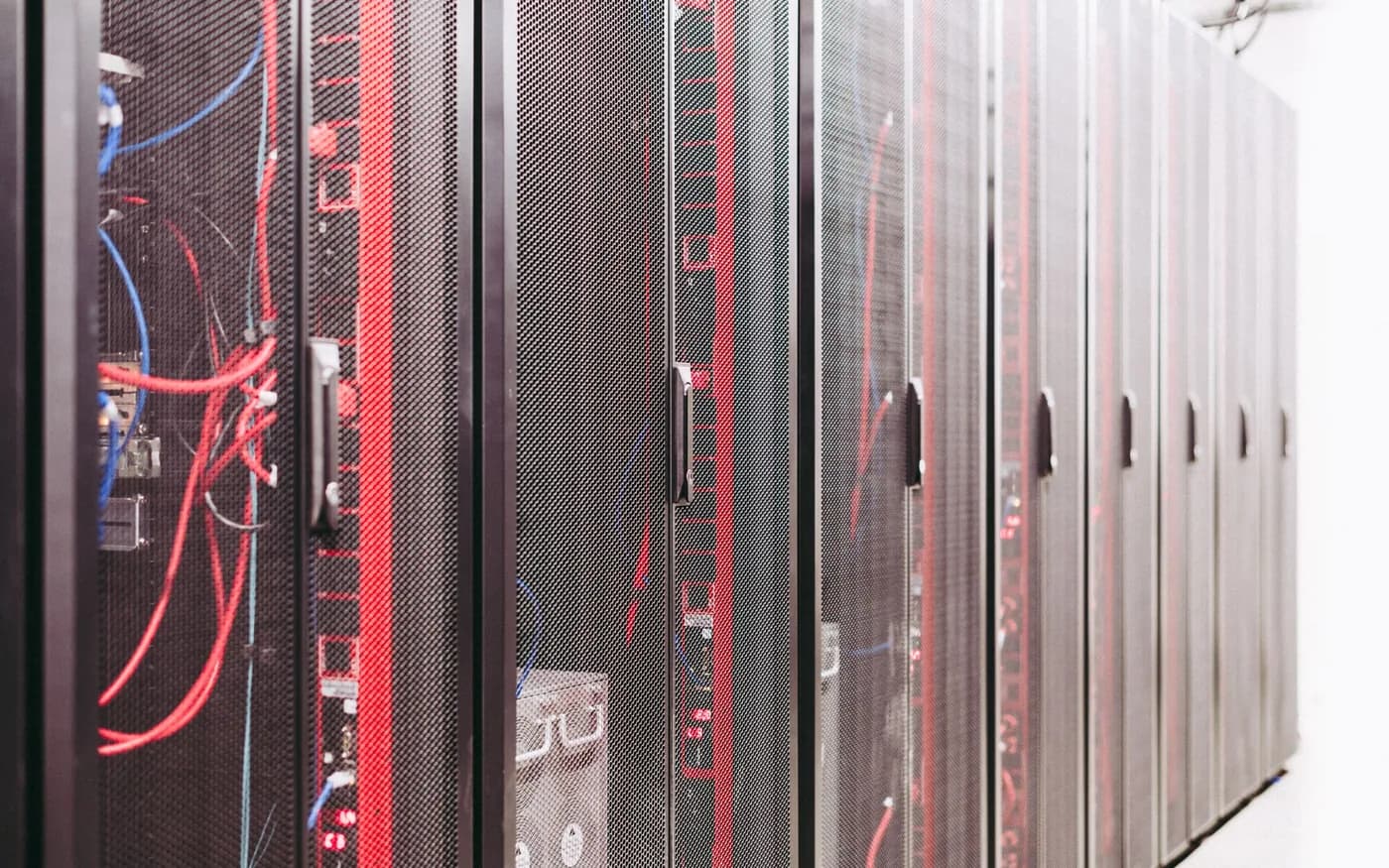Network equipment and red cables in server racks